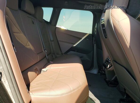 WB523CF0XSCU48350 2025 BMW IX Blue Vista interior trasera