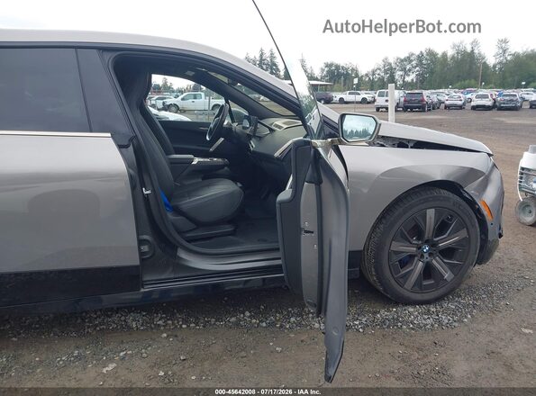 WB533CF00RCR68085 2024 BMW IX Pewter Front interior view