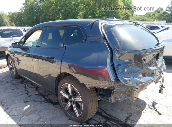 WB543CF0XTCV06385 2026 BMW IX Black Вид спереду