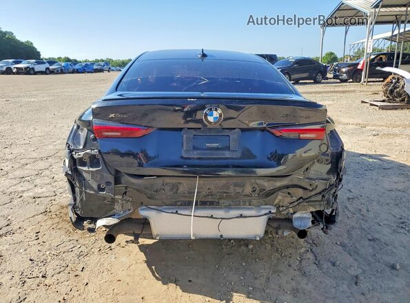 WBA13AR07MCF20737 2021 BMW M4 Black უკანა ხედი