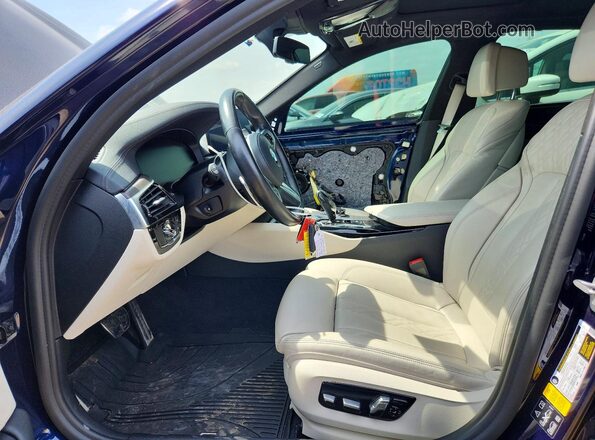WBA13BK01MCF83557 2021 BMW M5 Blue Widok wnętrza z przodu