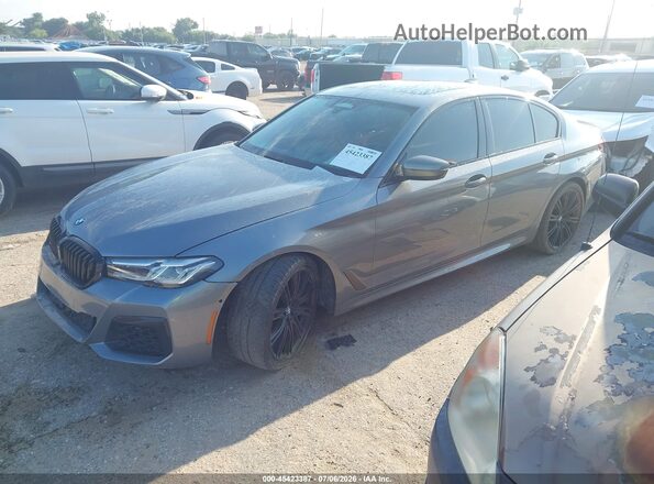 WBA13BK03PCM25545 2023 BMW M5 Gray Առջևի ձախ երեք քառորդ տեսարան