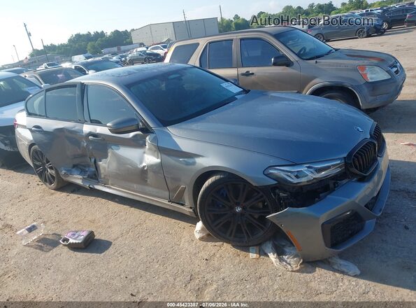 WBA13BK03PCM25545 2023 BMW M5 Gray Սալոնի հետևի տեսք