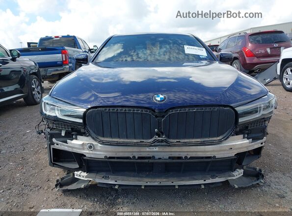 WBA13BK06NCJ46507 2022 BMW M5 Синий Вид задней части салона