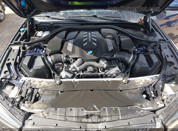 WBA13BK06NCJ46507 2022 BMW M5 Синий Вид сзади