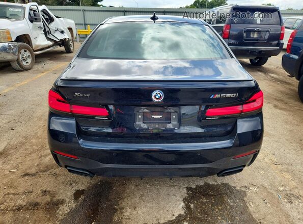 WBA13BK0XPCL25460 2023 BMW M5 Black Հետևի տեսք