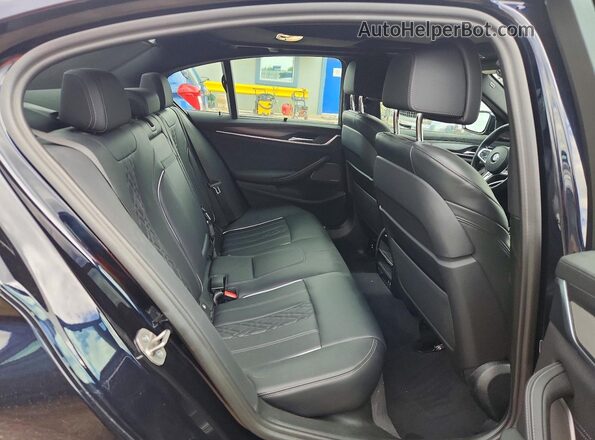 WBA13BK0XPCL25460 2023 BMW M5 Black Հետևի նստատեղերի տեսք