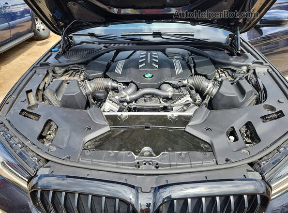 WBA13BK0XPCL25460 2023 BMW M5 Black Սալոնի հետևի տեսք