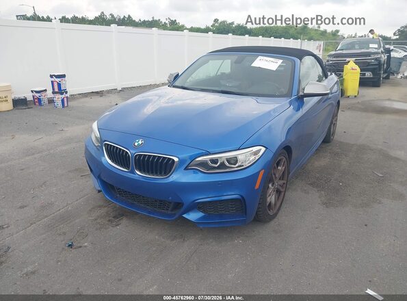 WBA1M1C53GV394593 2016 BMW M2 Blue Առջևի ձախ երեք քառորդ տեսարան