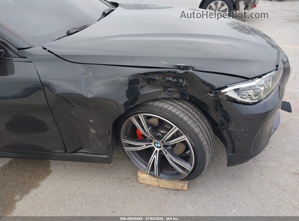 WBA23AT00PCL91772 2023 BMW 4 SERIES Black Front view