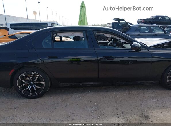 WBA23EH03TCW52130 2026 BMW 7 SERIES Black Widok wnętrza z tyłu