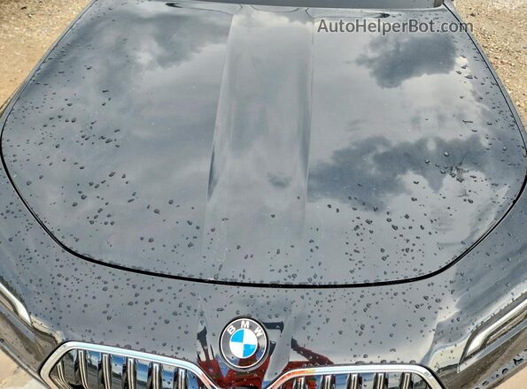 WBA23EH08RCS25938 2024 BMW 7 SERIES Черный Вид задней части салона