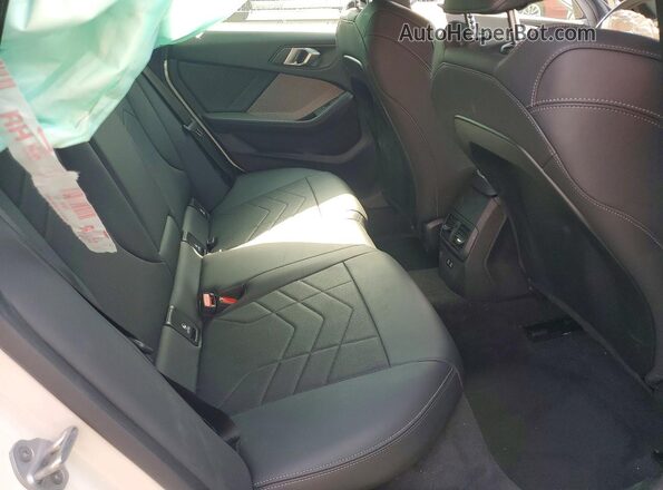 WBA23GG04T7U13238 2026 BMW 2 SERIES White Vista de los asientos traseros