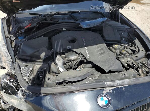 WBA2J7C56KVD61079 2019 BMW M2 Black Vista interior trasera