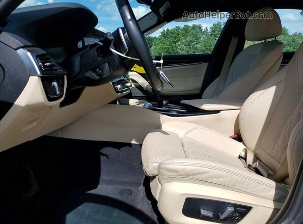 WBA33AG08PCM53871 2023 BMW 5 SERIES Blue Vista interior delantera