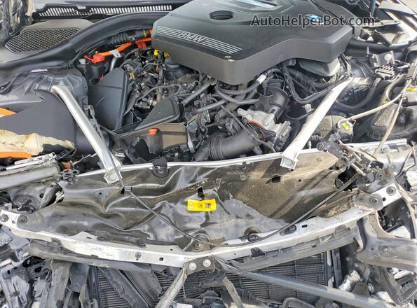 WBA33AG0XNCK81050 2022 BMW 5 SERIES Gray Vista interior trasera