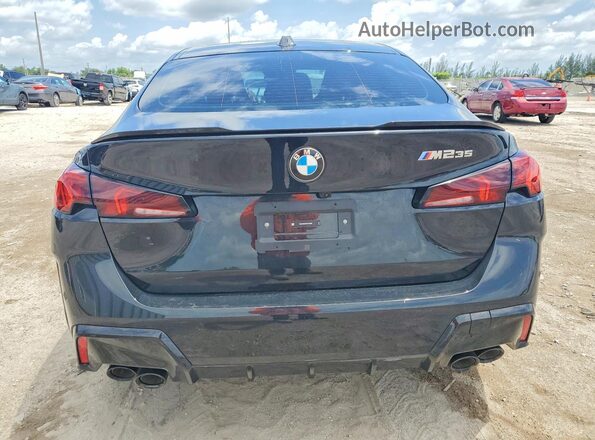 WBA33GG0XS7S16688 2025 BMW M2 Black Հետևի տեսք