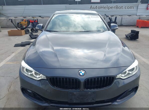 WBA3N7C51GK228311 2016 BMW 4 SERIES Серый Вид задней части салона