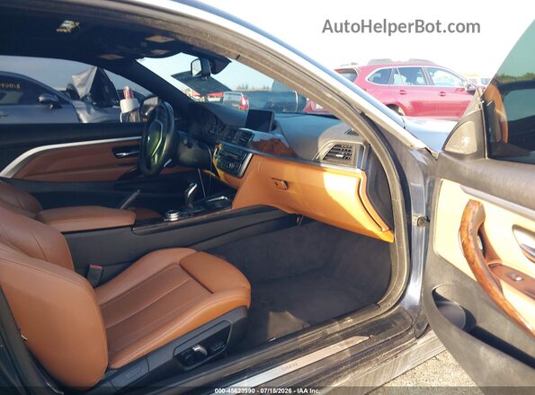 WBA3R5C58GK373211 2016 BMW 4 SERIES Black Front interior view