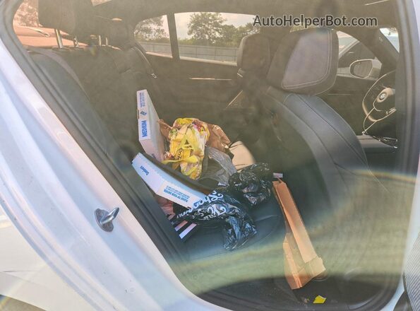 WBA43FJ04RCS11897 2024 BMW 5 SERIES White Rear seats view