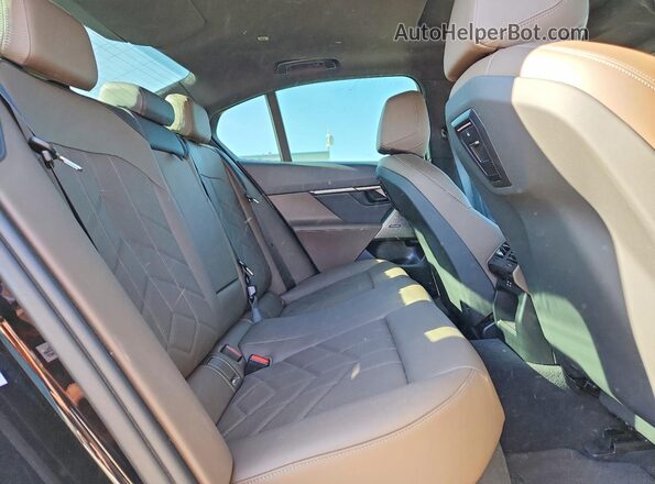 WBA43FJ09RCS21194 2024 BMW 5 SERIES Black Rear seats view