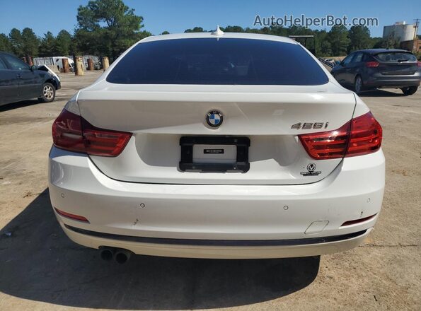 WBA4A9C50GG695668 2016 BMW 4 SERIES White Widok z tyłu