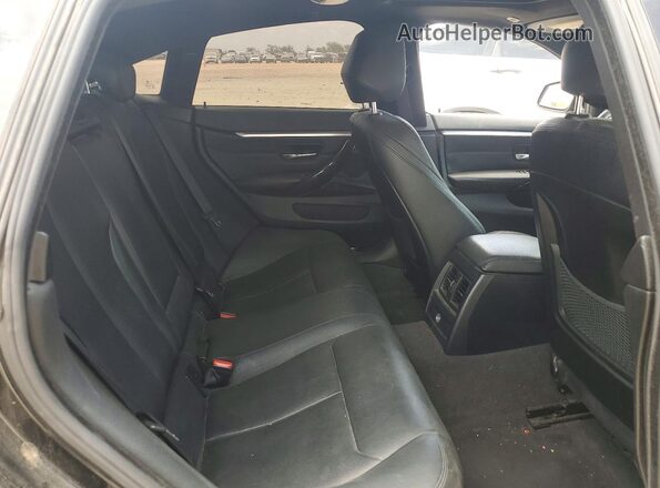 WBA4A9C50GGL87724 2016 BMW 4 SERIES Black Հետևի նստատեղերի տեսք