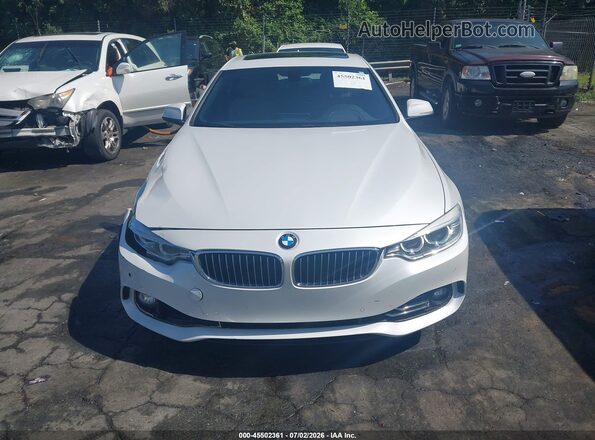WBA4A9C53GG505460 2016 BMW 4 SERIES White Սարքավորումների վահանակի տեսք