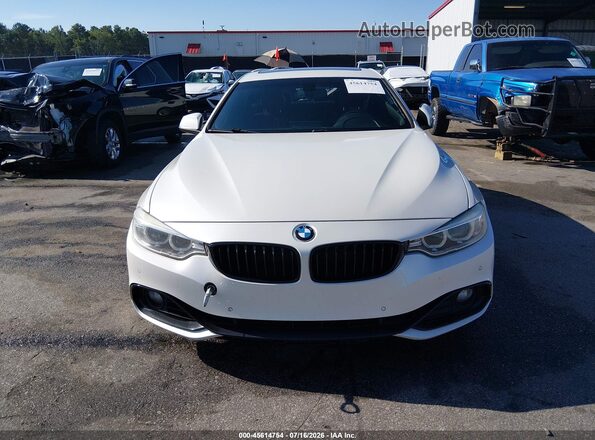 WBA4A9C56GG505467 2016 BMW 4 SERIES White Widok wnętrza z tyłu