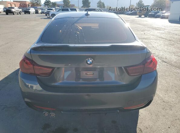 WBA4A9C57GG695571 2016 BMW 4 SERIES Gray უკანა ხედი