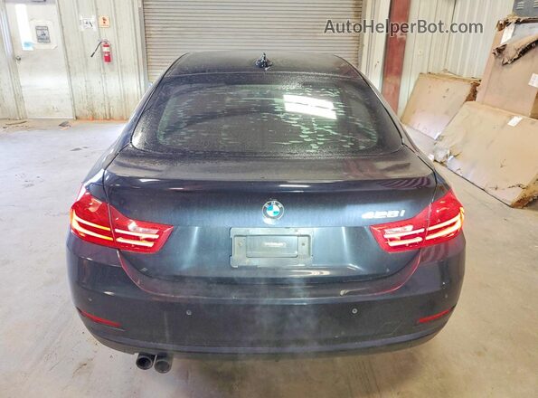 WBA4A9C59GG508699 2016 BMW 4 SERIES Black Rear view