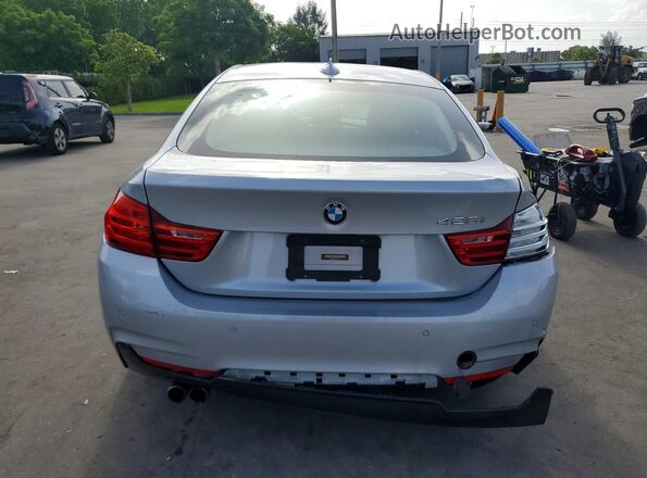 WBA4A9C59GG508797 2016 BMW 4 SERIES Silver Widok z tyłu