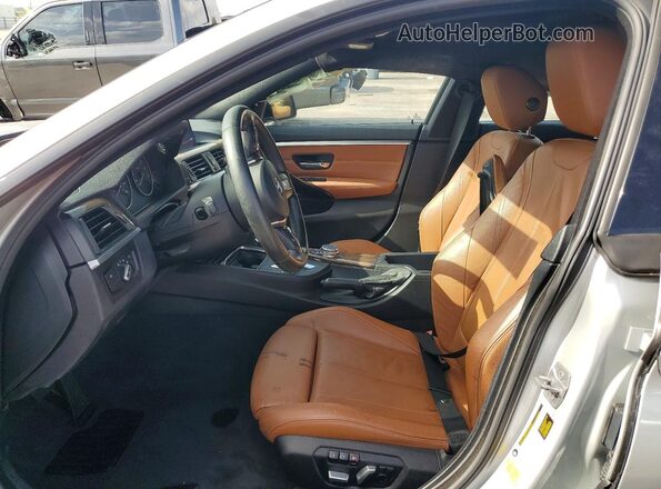WBA4A9C59GG508797 2016 BMW 4 SERIES Silver Widok wnętrza z przodu