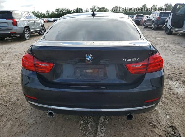 WBA4B1C54GG242720 2016 BMW OTHER Black Widok z tyłu