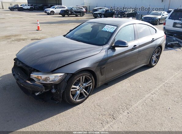 WBA4B1C58GG242400 2016 BMW 4 SERIES Gray Vista tres cuartos delantera izquierda