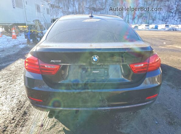 WBA4C9C58GG141014 2016 BMW 4 SERIES Черный Вид сзади