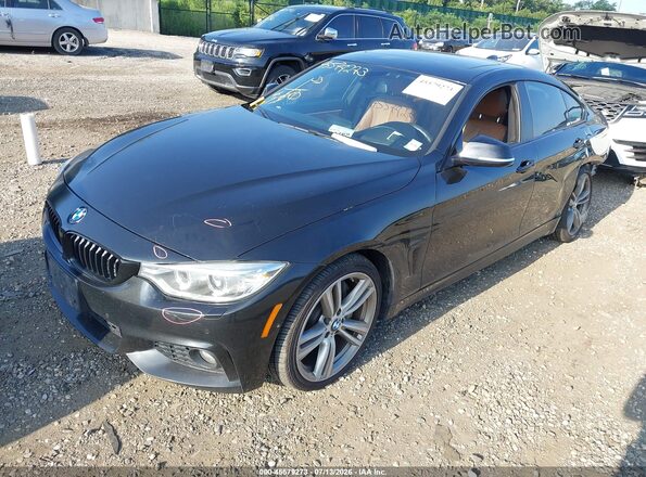 WBA4E5C33HG810714 2017 BMW 4 SERIES Black Vista tres cuartos delantera izquierda