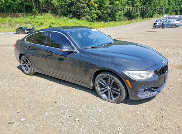 WBA4F9C59HG440391 2017 BMW 4 SERIES Black Front right