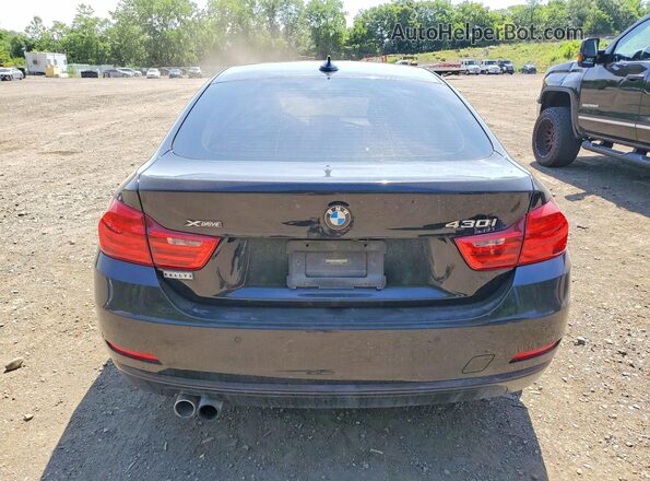 WBA4F9C59HG440391 2017 BMW 4 SERIES Black Rear view