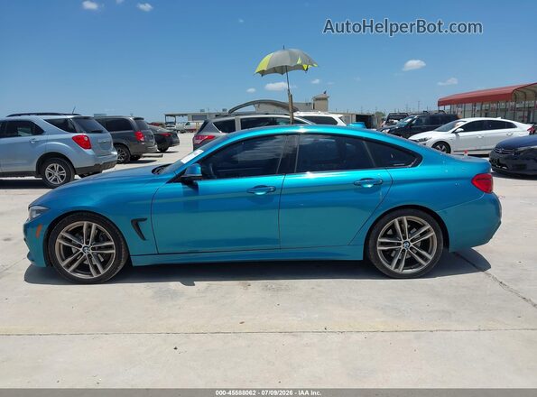 WBA4J1C52JBM11219 2018 BMW 4 SERIES Бирюзовый Панорамный вид салона 360°