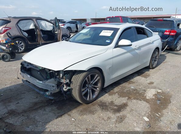 WBA4J1C57KBM13372 2019 BMW 4 SERIES White Առջևի ձախ երեք քառորդ տեսարան