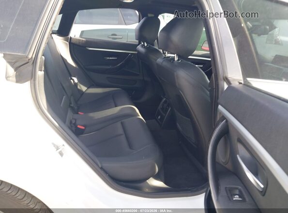 WBA4J1C57KBM13372 2019 BMW 4 SERIES White VIN կոդի պիտակի տեսք