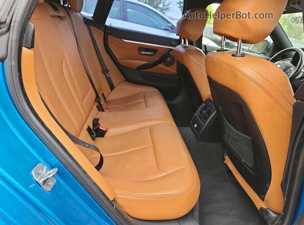 WBA4J3C50JBG95769 2018 BMW 4 SERIES Blue Հետևի նստատեղերի տեսք