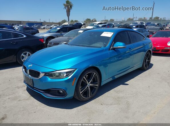 WBA4J5C50JBM64878 2018 BMW 4 SERIES Синий Передняя левая четверть