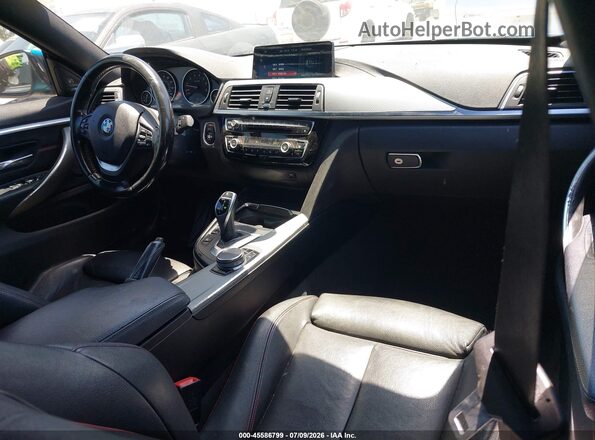 WBA4J5C50JBM64878 2018 BMW 4 SERIES Синий Вид салона спереди