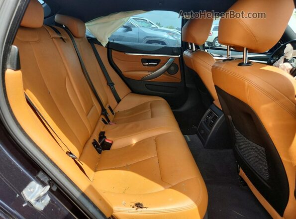 WBA4J7C09LBV99506 2020 BMW 4 SERIES Black Widok tylnych siedzeń