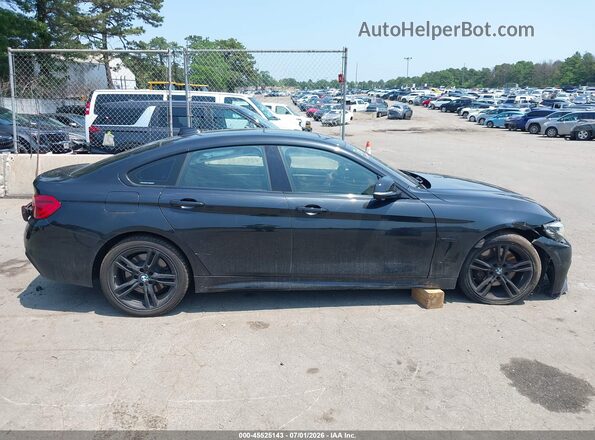 WBA4J7C54KBM74245 2019 BMW 4 SERIES Черный Вид задней части салона