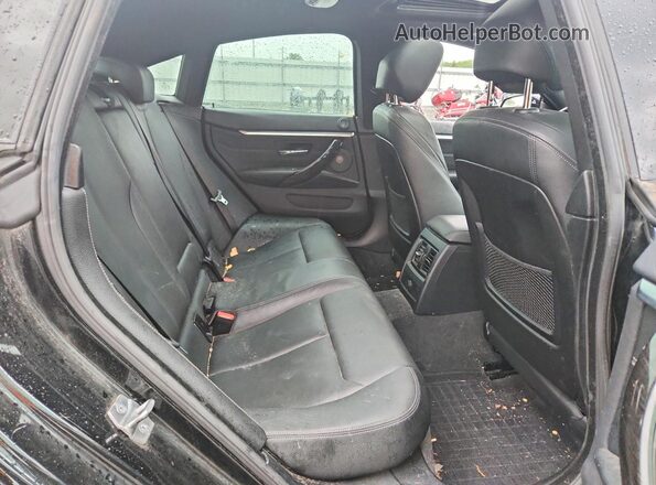 WBA4J7C57KBM76409 2019 BMW 4 SERIES Black Widok tylnych siedzeń
