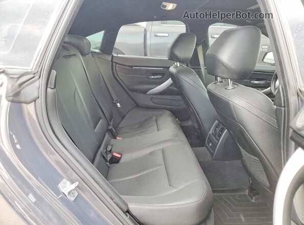 WBA4J7C58JBH14611 2018 BMW 4 SERIES Gray Widok tylnych siedzeń
