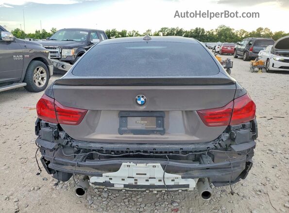 WBA4J7C58JBH14611 2018 BMW 4 SERIES Gray Widok z tyłu